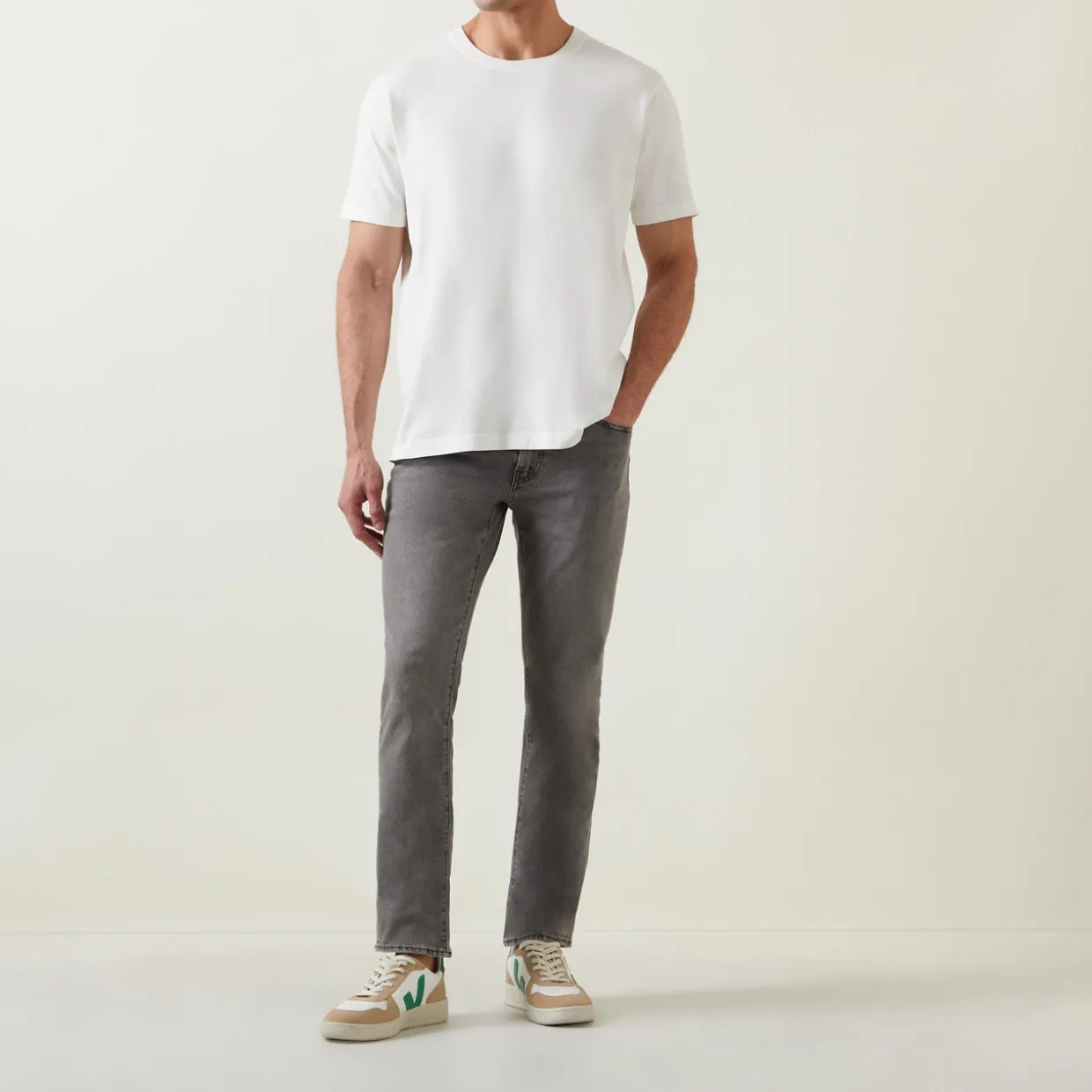511™ Mid-Rise Slim Leg Jeans