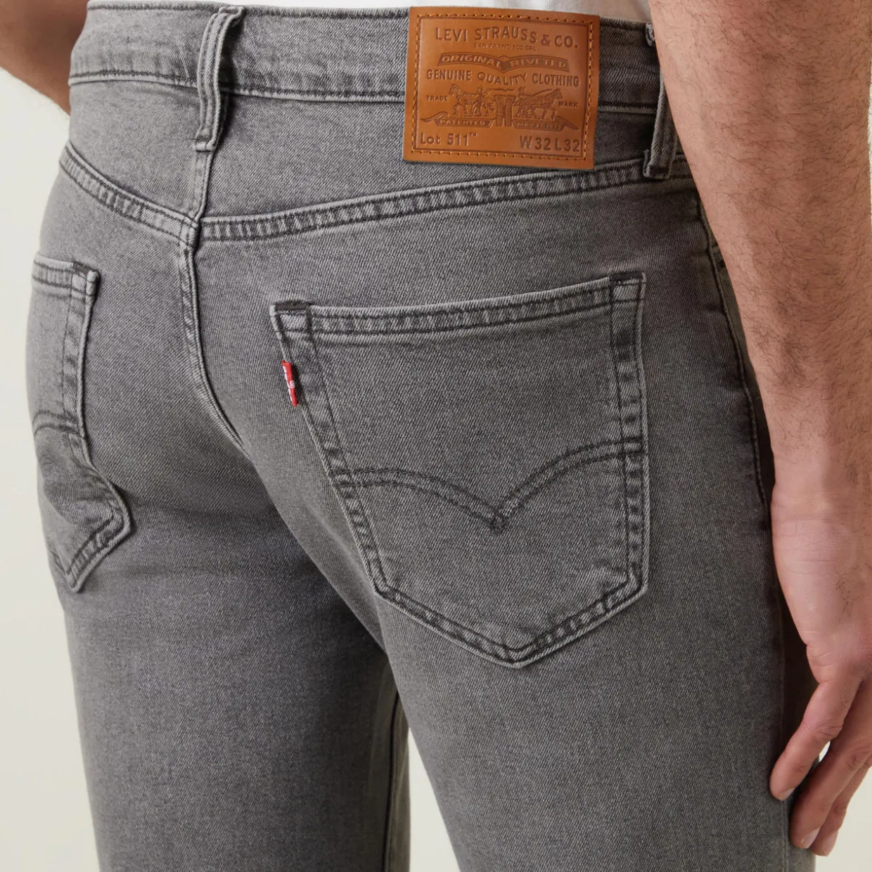 511™ Mid-Rise Slim Leg Jeans