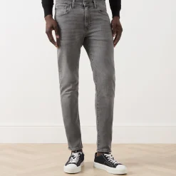512™ Mid-Rise Slim Tapered Jeans