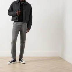 512™ Mid-Rise Slim Tapered Jeans