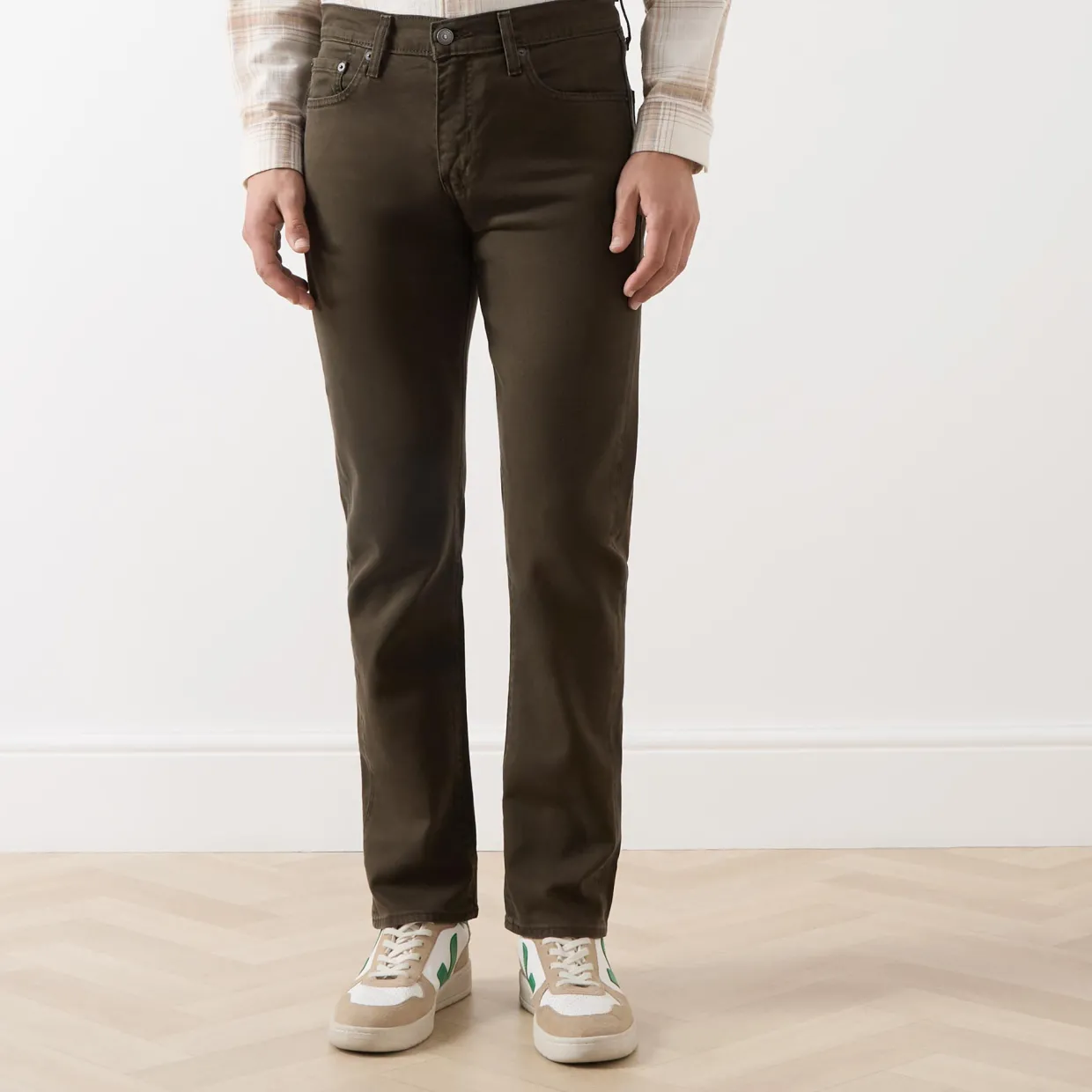 502™ Mid-Rise Tapered Jeans