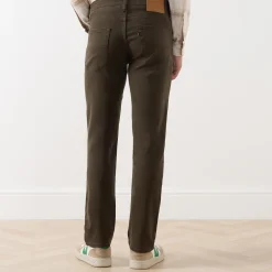 502™ Mid-Rise Tapered Jeans