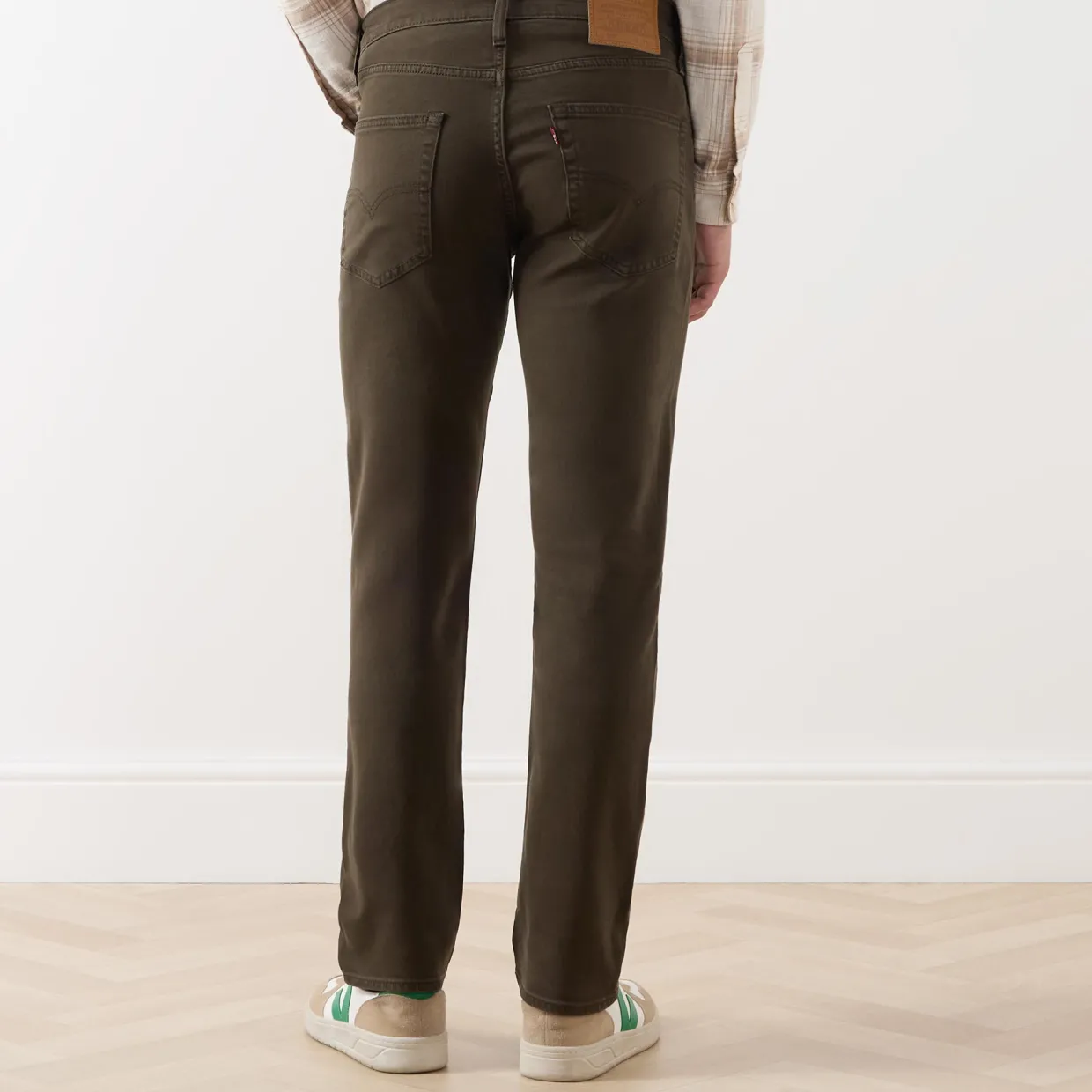 502™ Mid-Rise Tapered Jeans