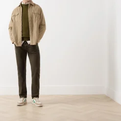 502™ Mid-Rise Tapered Jeans