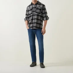 502™ Mid-Rise Tapered Jeans