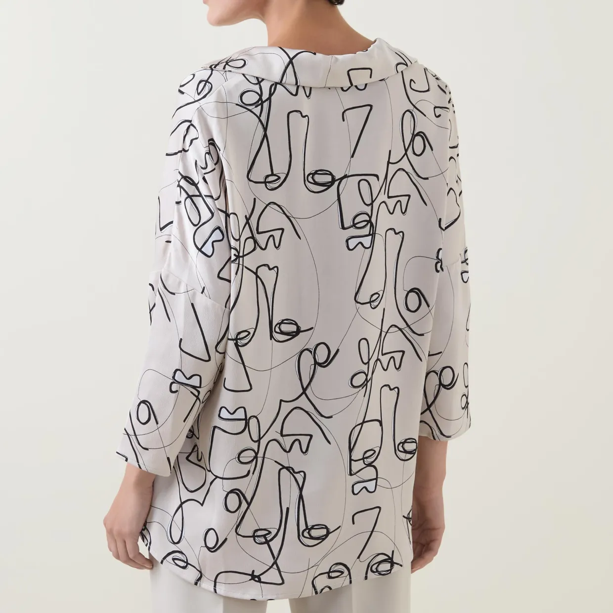 Abstract Face Print Blouse