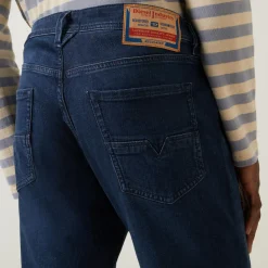 Larkee-Beex Mid-Rise Tapered Jeans